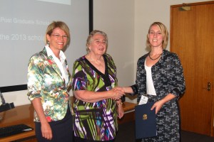 Katrina Hodgkinson MP and Vicky Cullen present Sam with her award